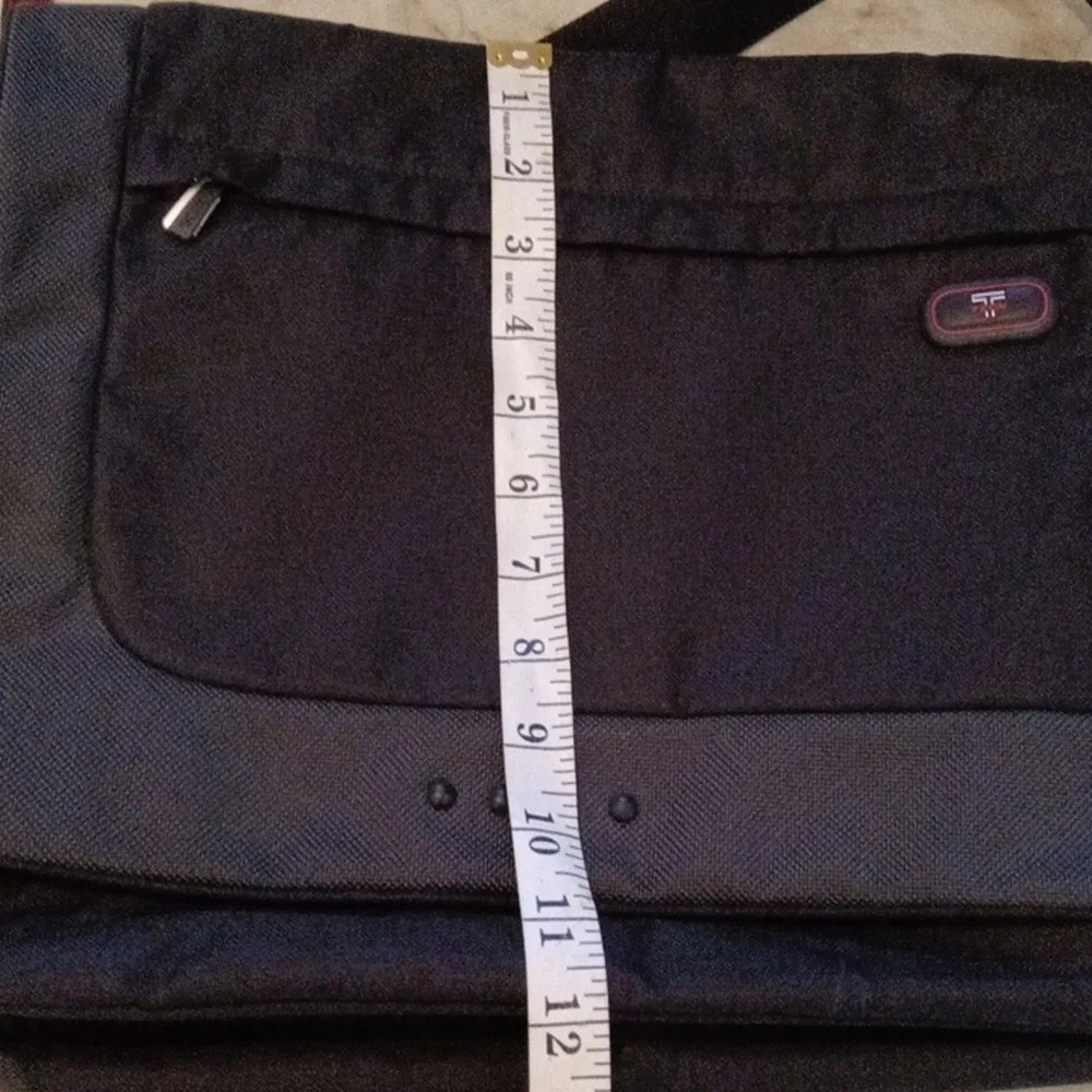 Tumi Black Laptop Messenger Bag.
